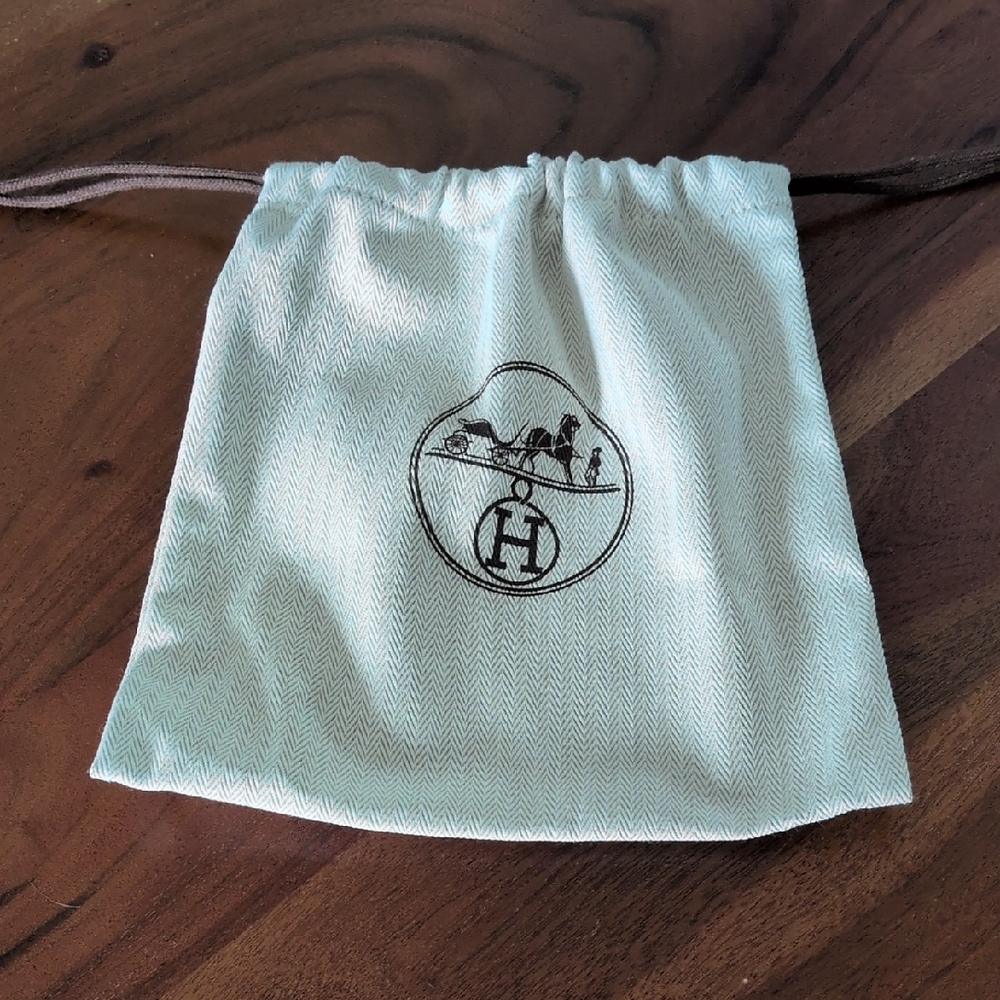 Hermes Cream Drawstring Pouch